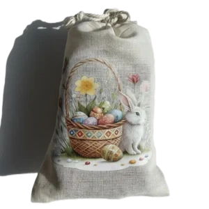 Oster-Geschenkbeutel aus Leinen mit Hasen-Motiv und bunten Ostereiern im Korb für Fruchtleder-Snacks.