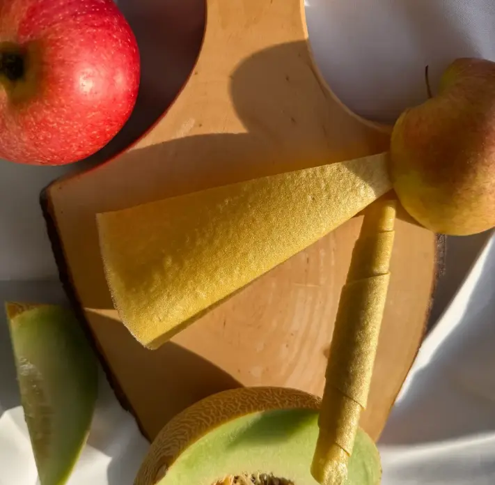 Melone Fruchtleder Pastila mit apfel auf dem Desk